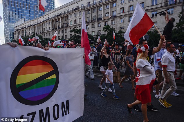 An anti-LGBT banner is seen during the 76th Anniversary of the Warsaw Uprising on August 01, 2020 in Warsaw, Poland