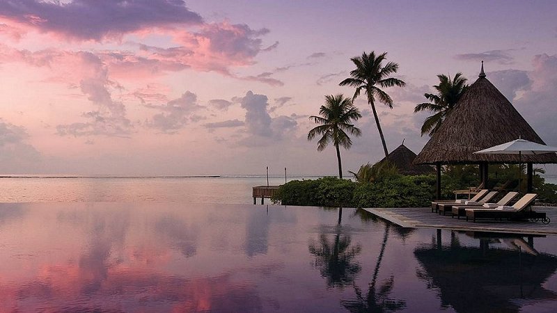 Infinity pool at the Four Seasons Resort at Kuda Huraa, Maldives.