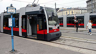 Modern "ULF"-tram at a station
